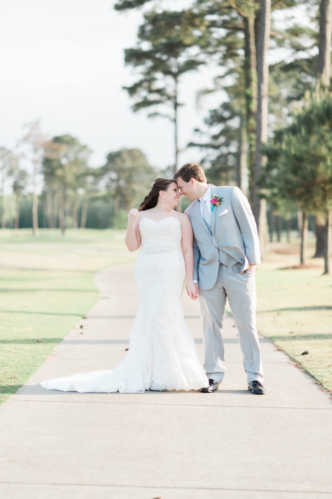 newlywed couple on golf course